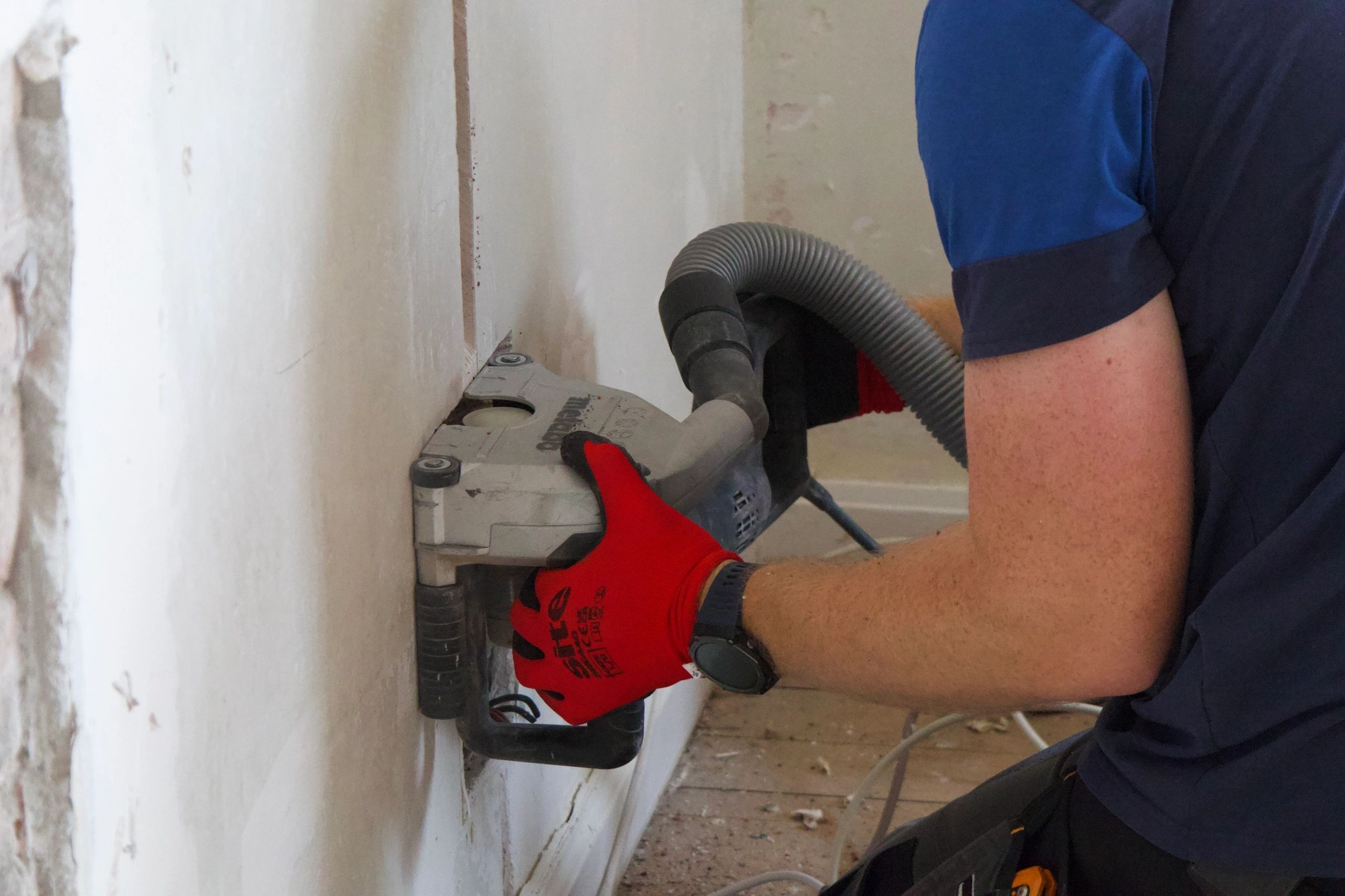 Electrician running cables during a house rewire